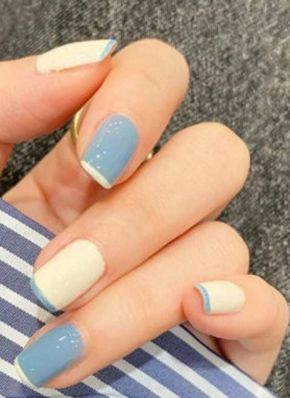 Blue & cream french tip acrylic short nails.