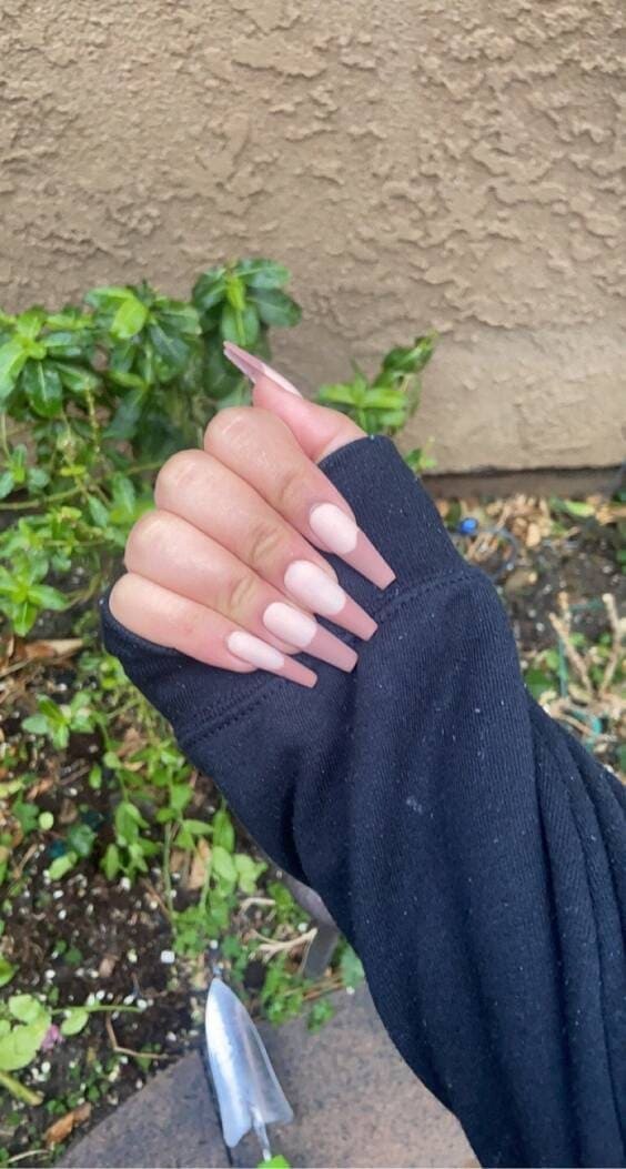 Matte brown french tip nails.