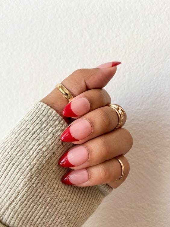 Red french tip nails.