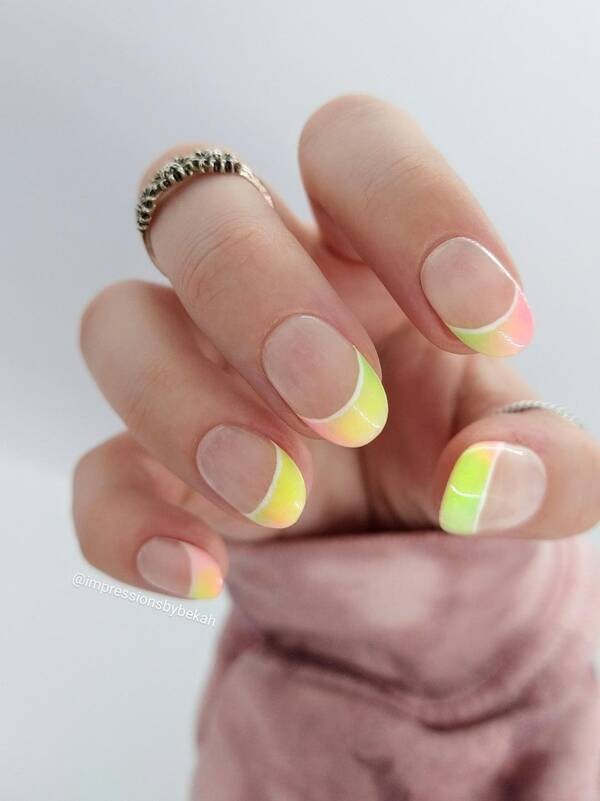 Pastel french tip glow in the dark nails.