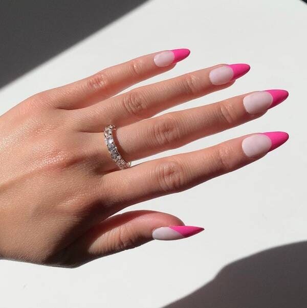 Barbie pink colored french tip nails.