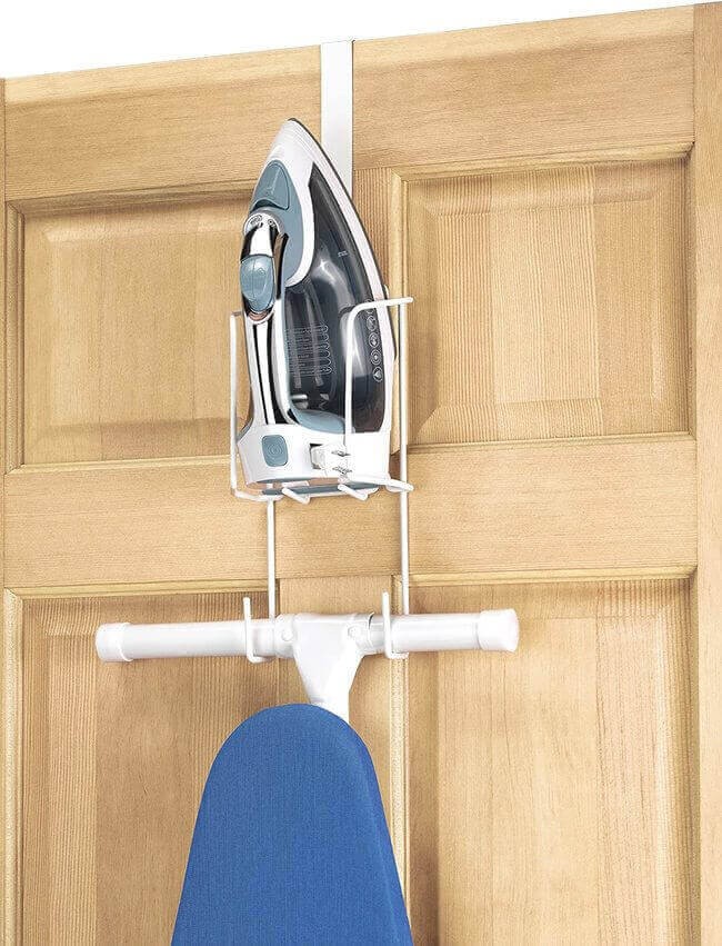 Hang (and hide) your ironing board behind the door.