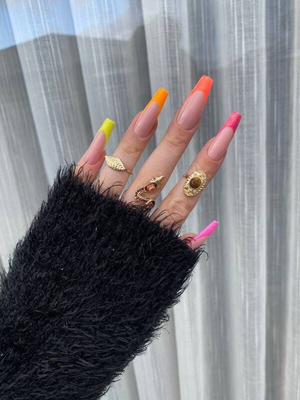 Sparkle me neon colored nails.