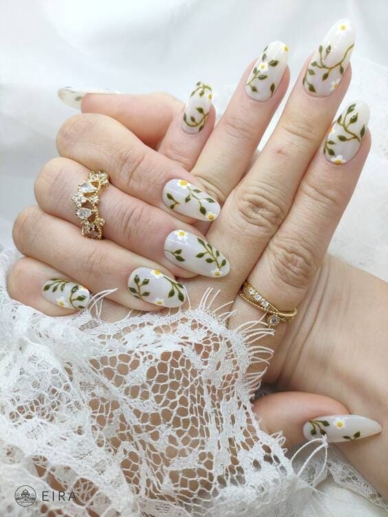 Flowers press on leaf nails.