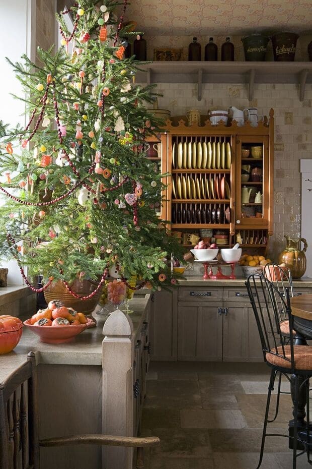 Give a Mini Tree a Christmas Theme in front of the window!