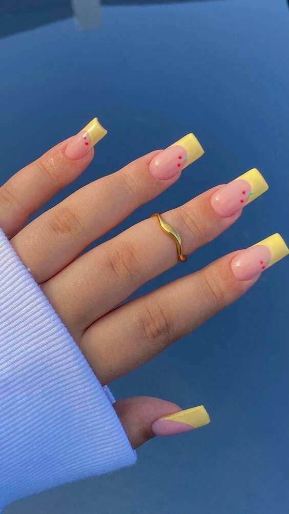 Yellow tip cherry nails.