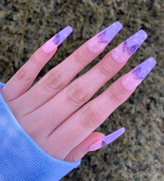 Butterfly nails with clouds.