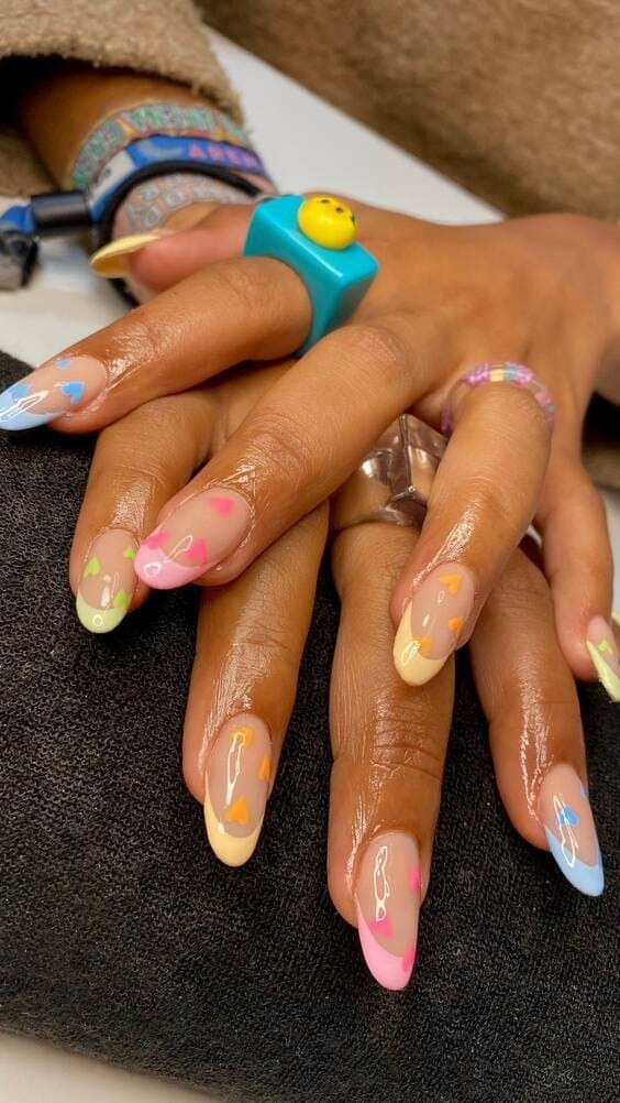 Heart-colored french nails.