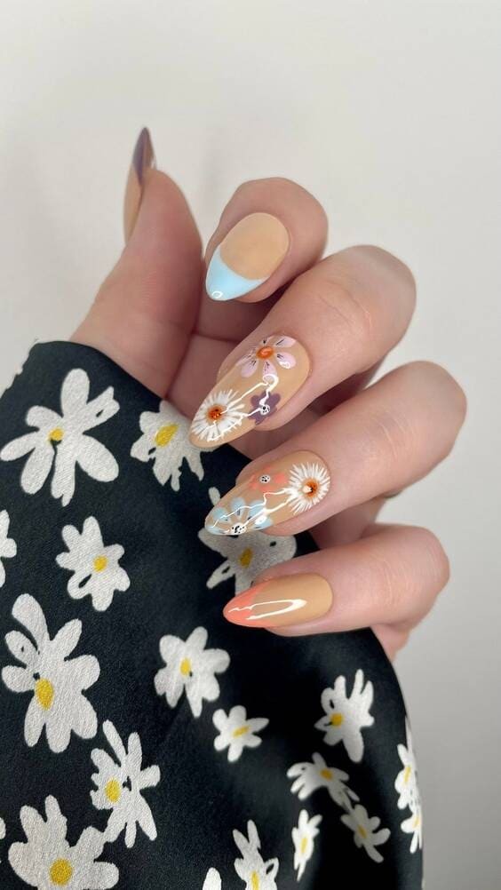 Pastel flower spring nails.