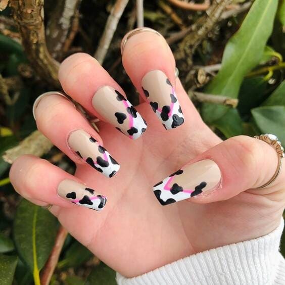 Cow print nails.