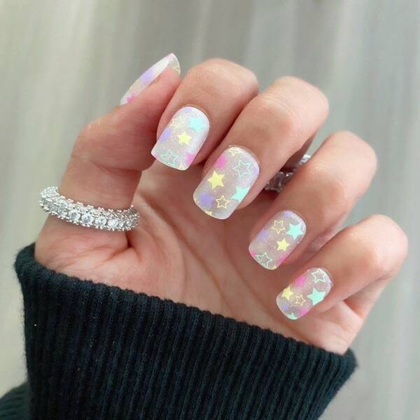 Confetti stars short nails.