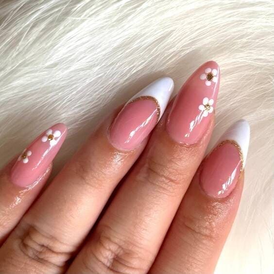 Sheer pink french tip nails.