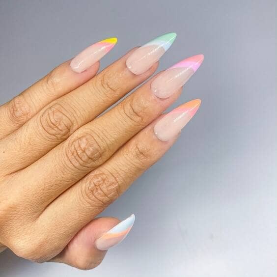 Colorful diagonal french tip nails.