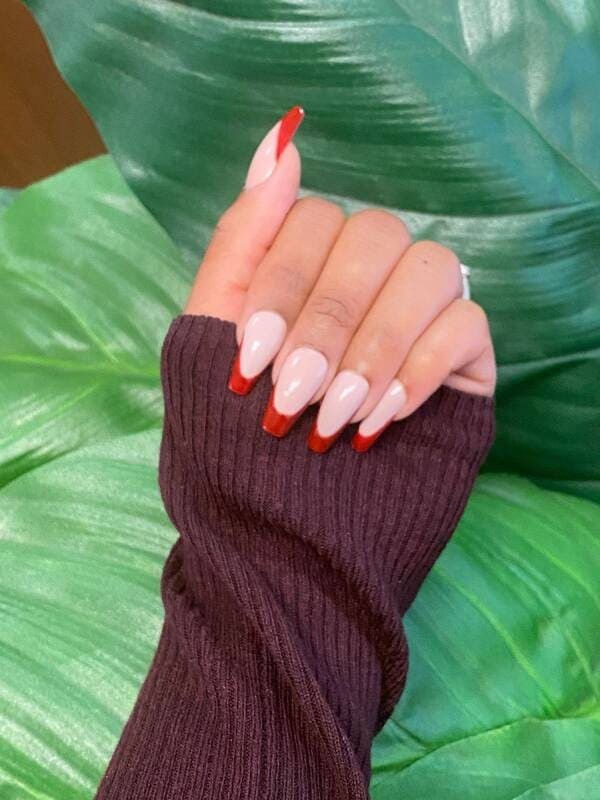 Poshy red Burgundy french manicure tips.