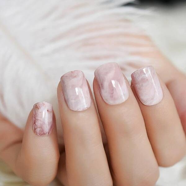 Light pink marble short square nails.