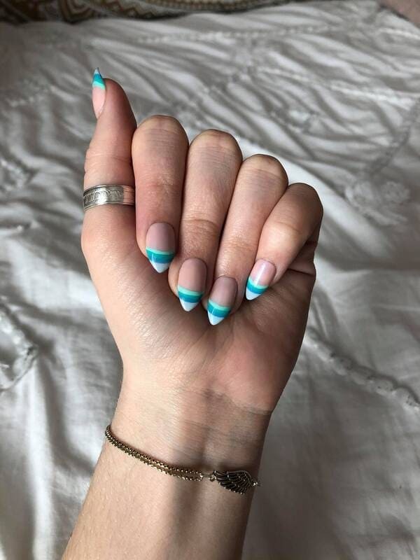 Abstract blue ombre nails.