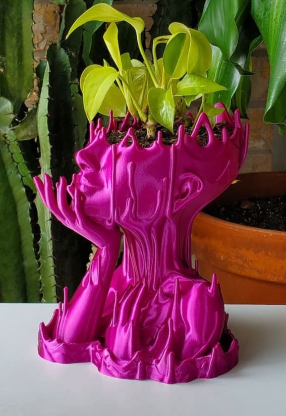 Sculptural Splendor: Melted Woman Medusa Face Plant Pot