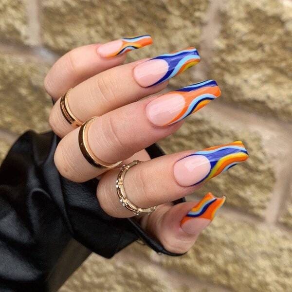 Blue & orange funky swirl nails.