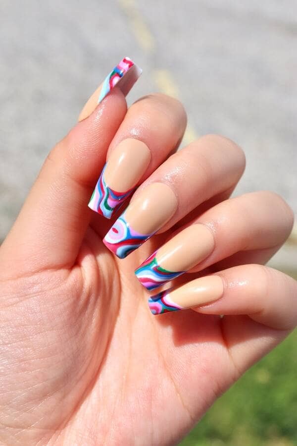 Groovy rainbow retro nails.