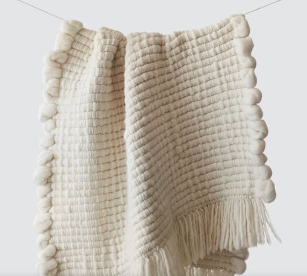 Celeste chunky wool throw, handwoven in Uruguay by the citizenry.