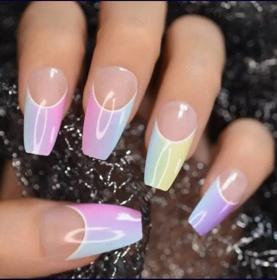 Rainbow Ombre French tip nails.