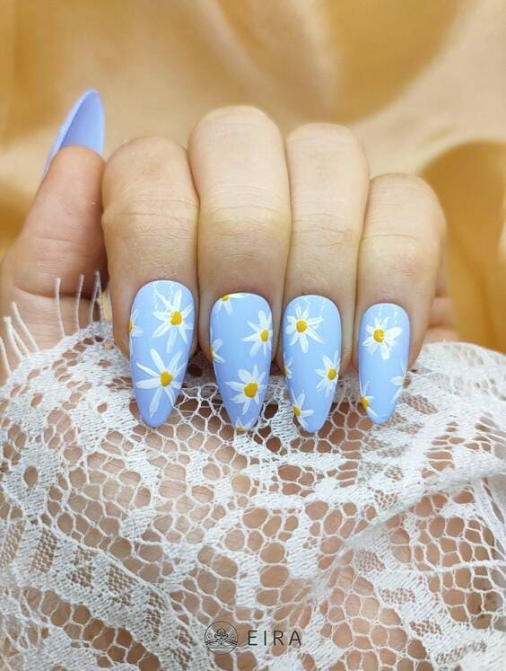 Baby blue pastel flower nails.