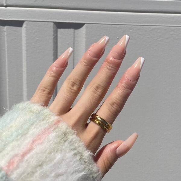 Beige and white-colored manicure.