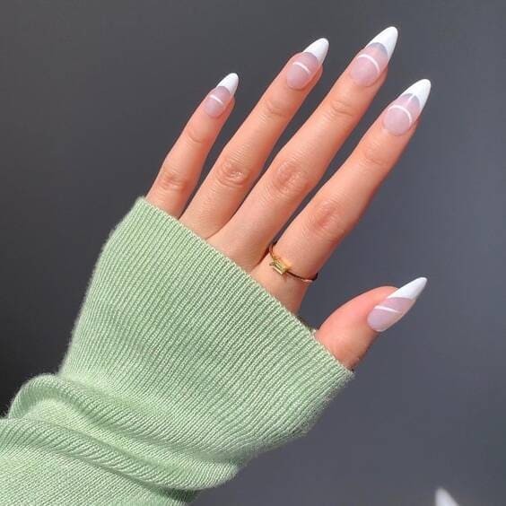 Double white french tip nails.