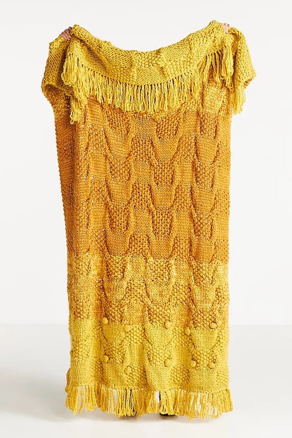 Telly Knit Throw Blanket by Anthropologie.