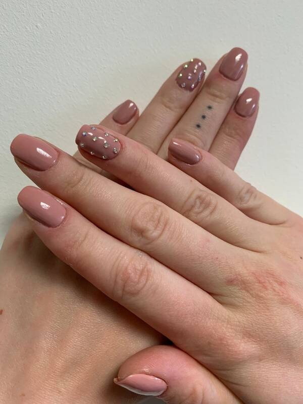 Nude coffin short square nails.