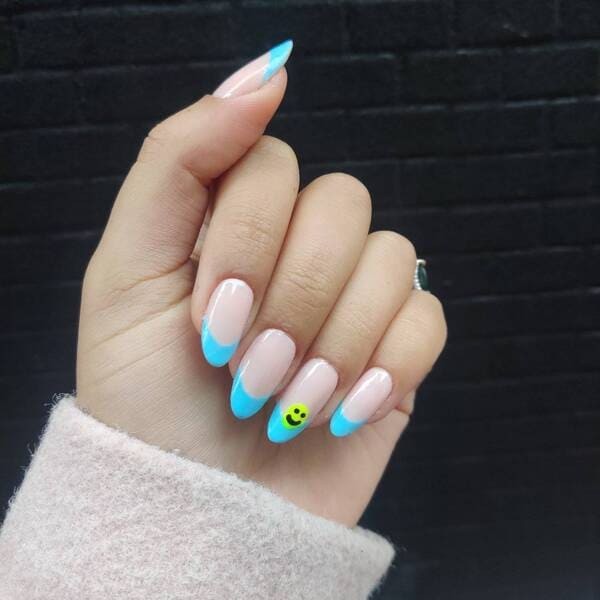 French tip smiley face blue nails.