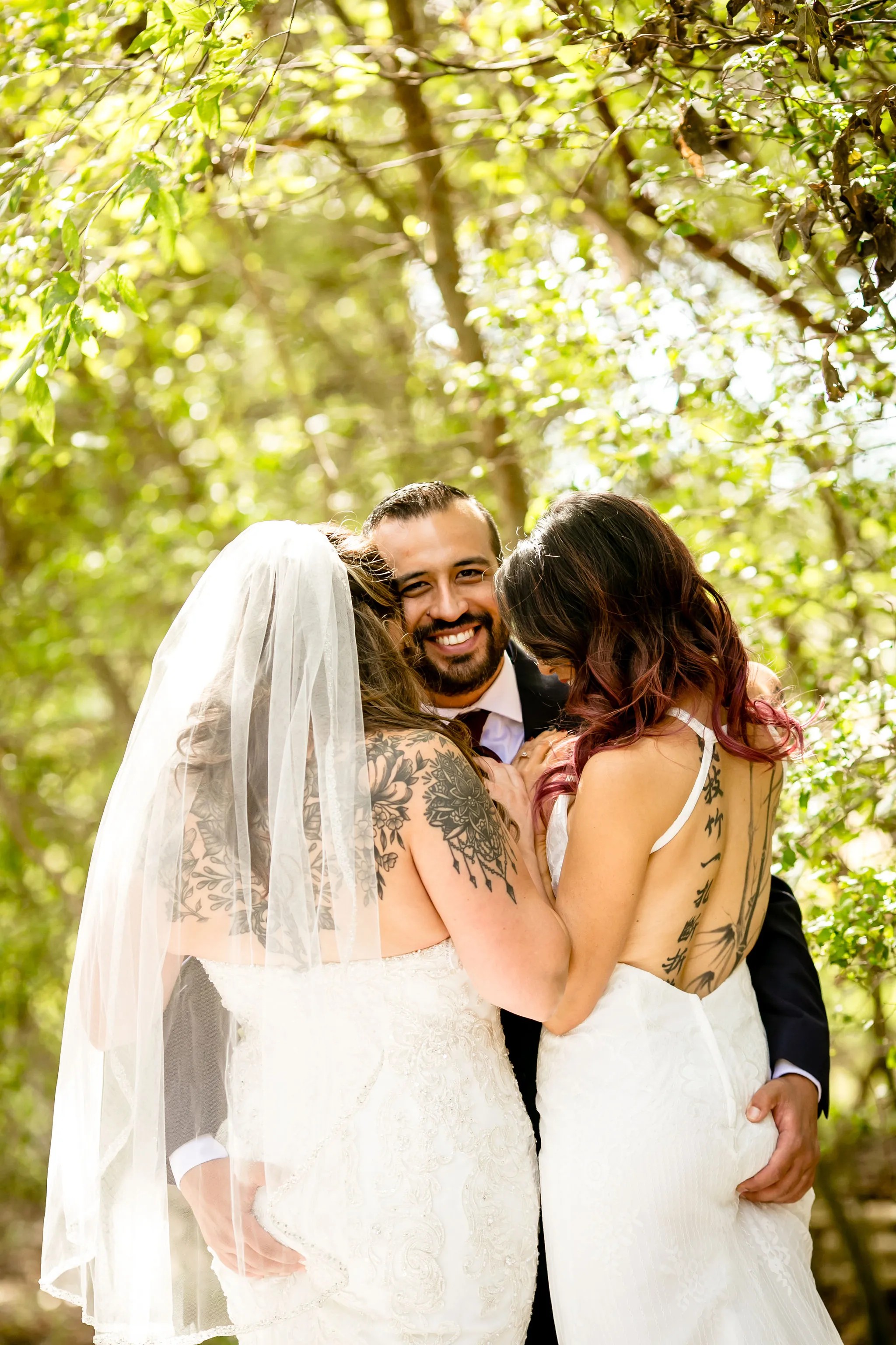 Polyamorous triad wedding portraits