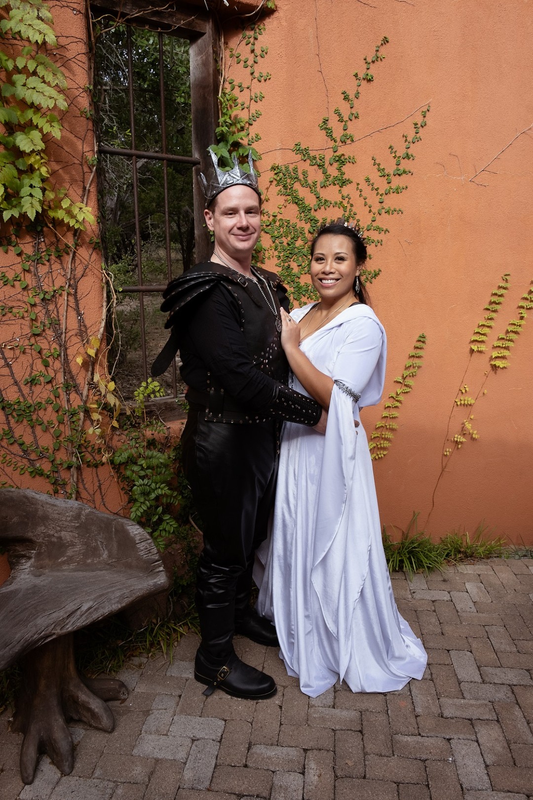 The crystal crown and Contessa gown are peak Lord of the Rings wedding.