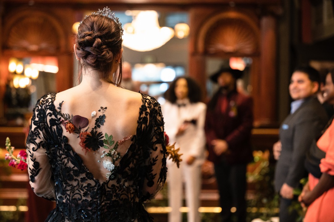 Check out the black wedding cake at this elegant Sleepy Hollow gothic wedding shoot