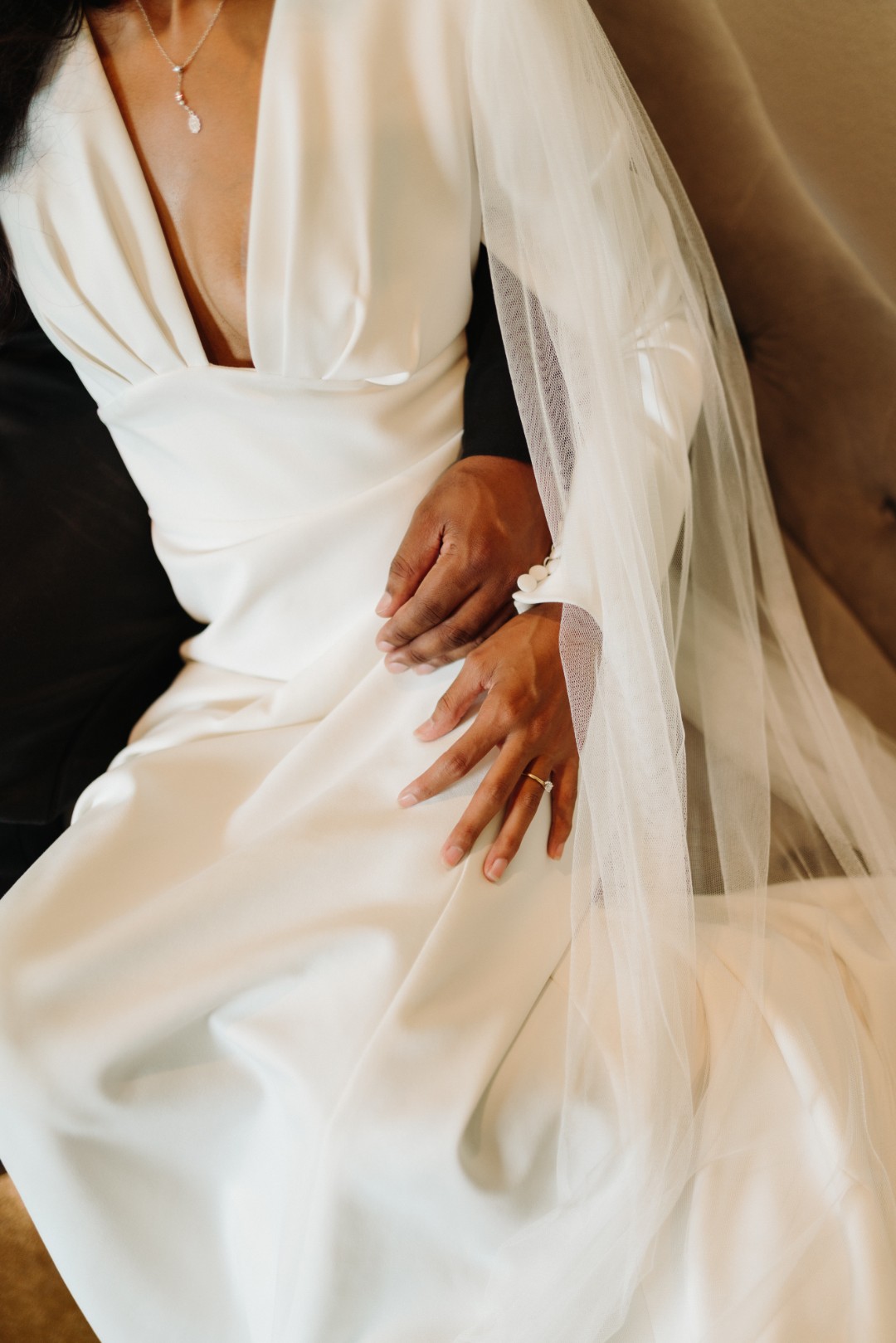 And OMG this long-sleeved wedding dress with trailing tulle wings. Can you imagine how this would look if you wore this while flying on a dragon?!