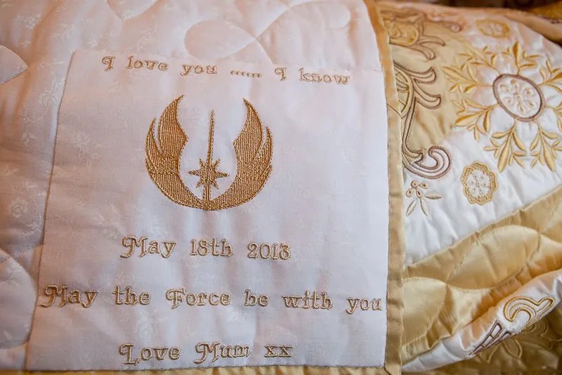 Awww! An embroidered silk bedspread from mum!