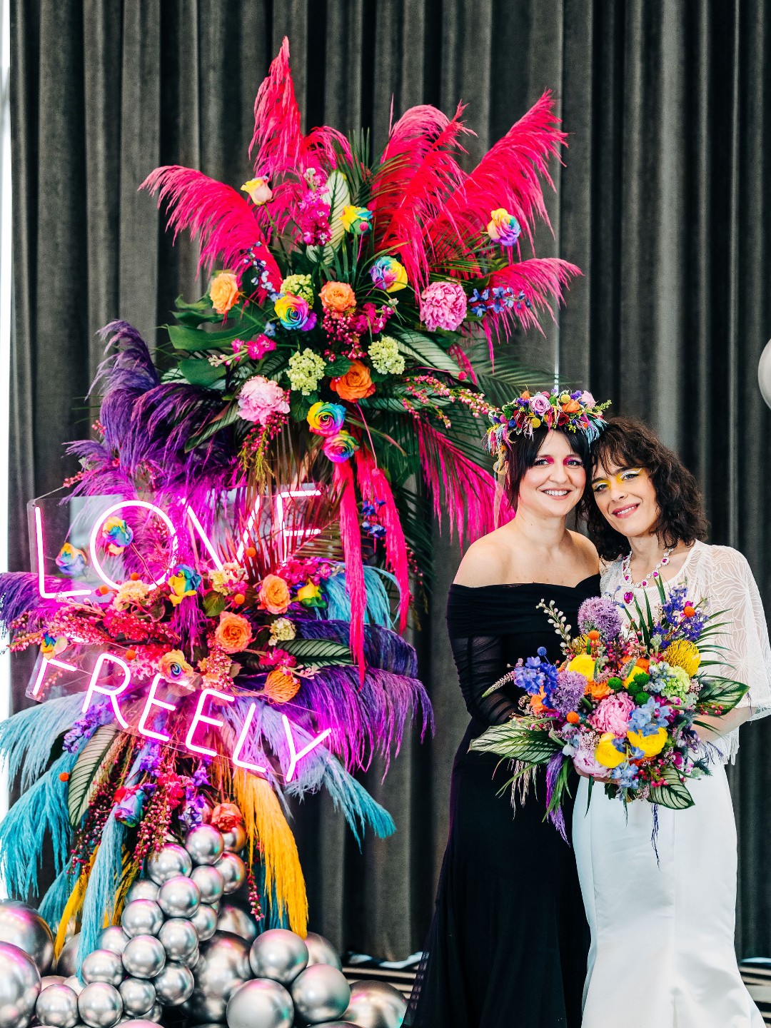 Yes, you can wear black and white to your colorful wedding