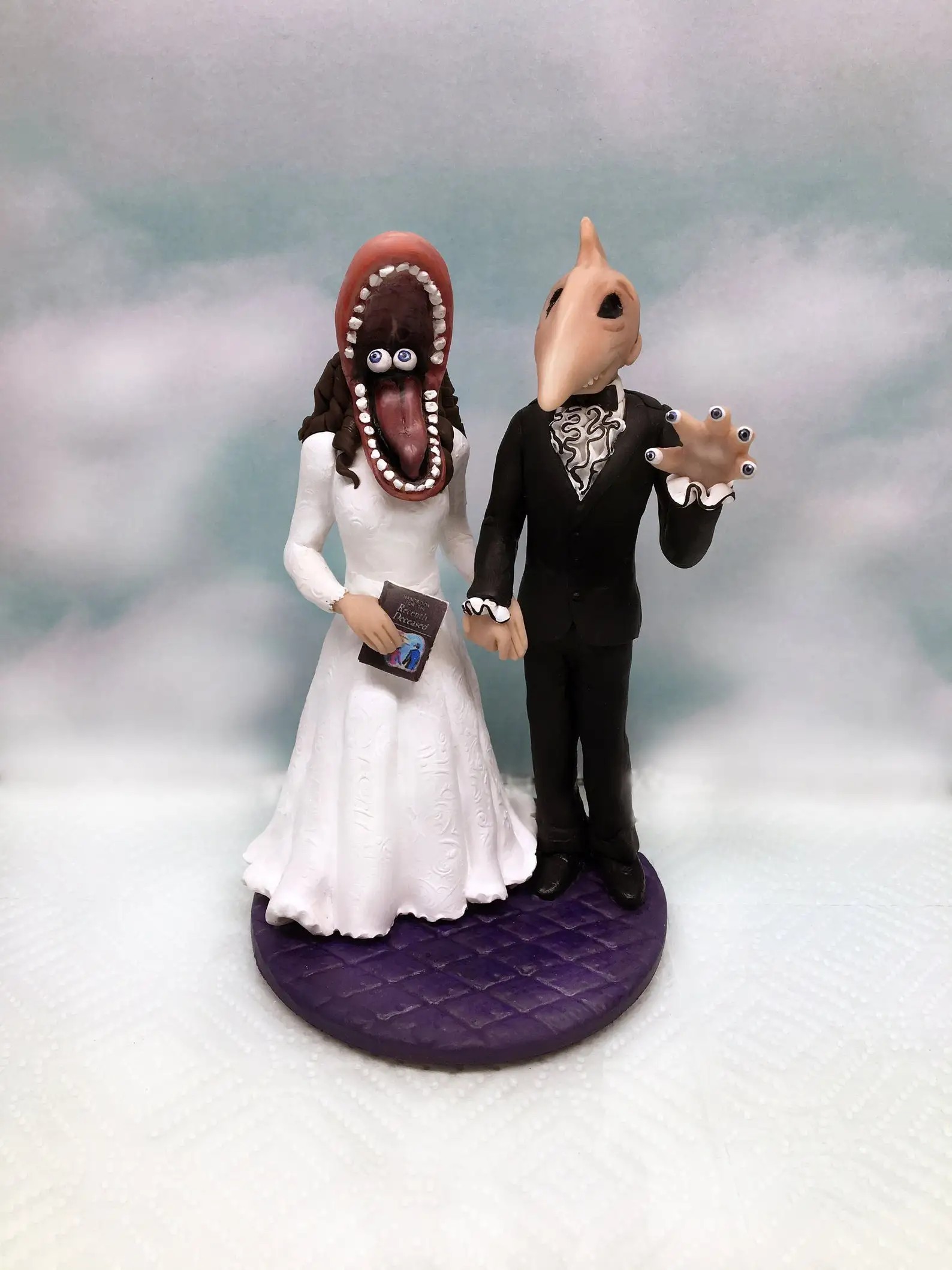 Pop culture goth cake toppers