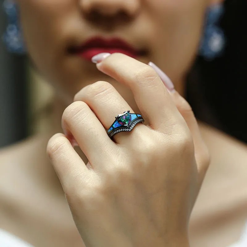 Black wedding rings with blue stones: sapphires, alexandrite, and other natural gemstones