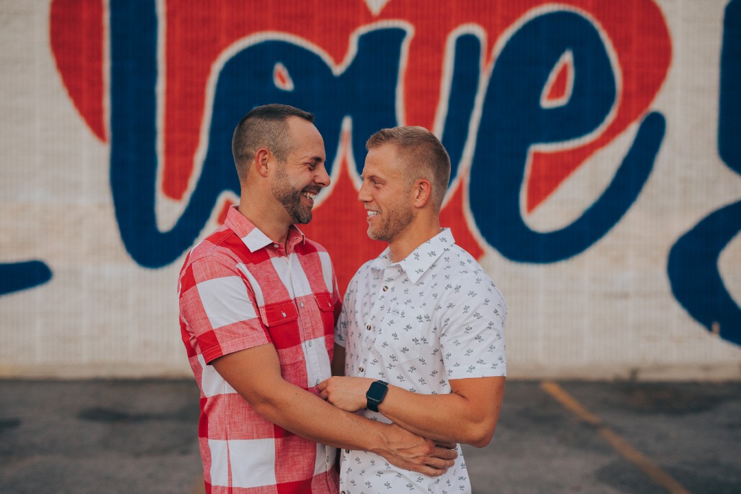 Unique engagement shoot idea #8: Make that cool graffiti wall in your neighborhood your new backdrop!