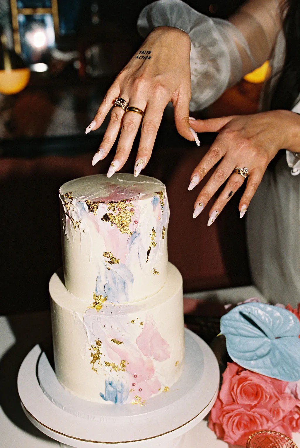 Our nail artist replicated our cake design, complete with gold foil and little pearls!