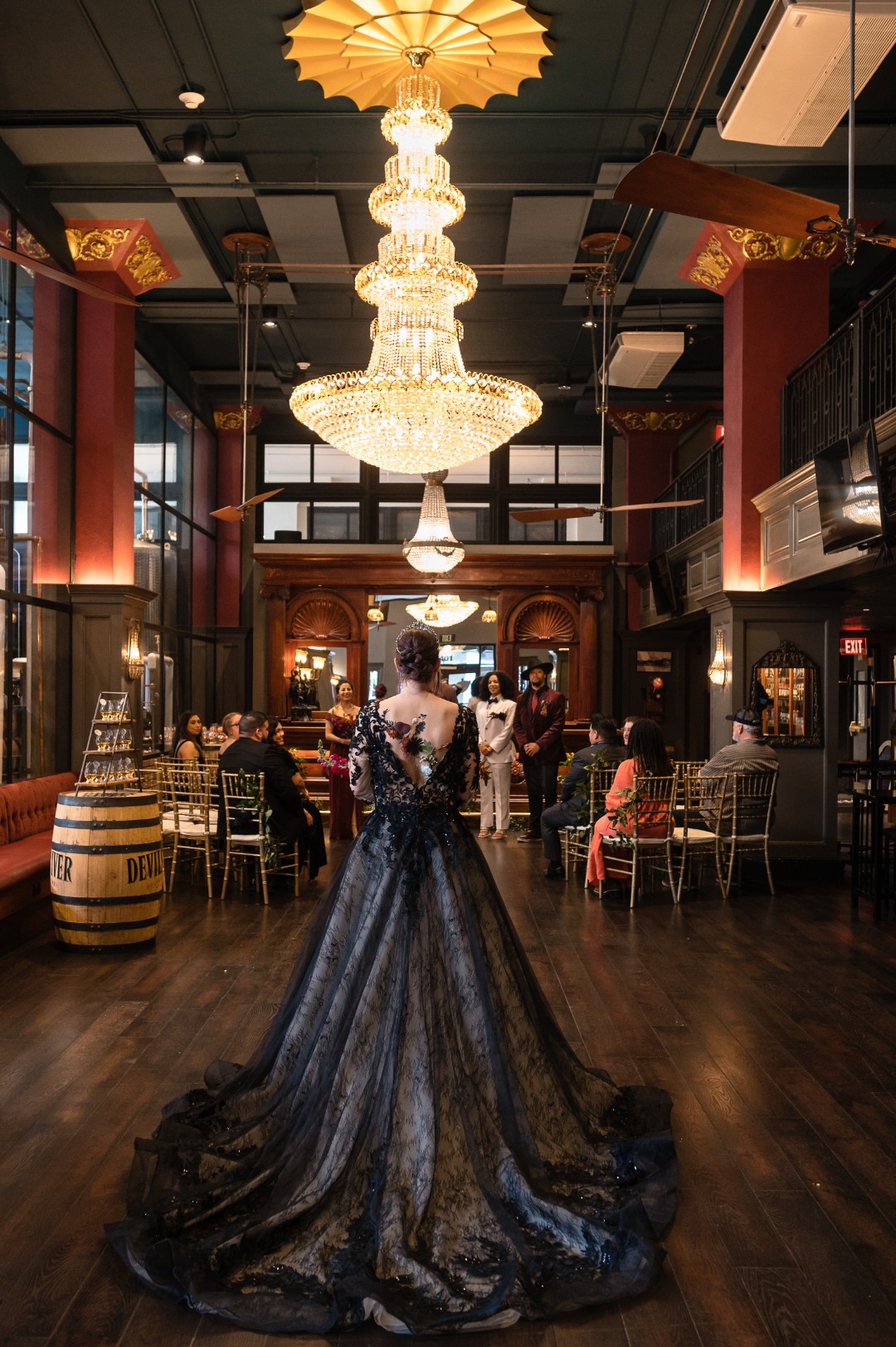 Check out the black wedding cake at this elegant Sleepy Hollow gothic wedding shoot