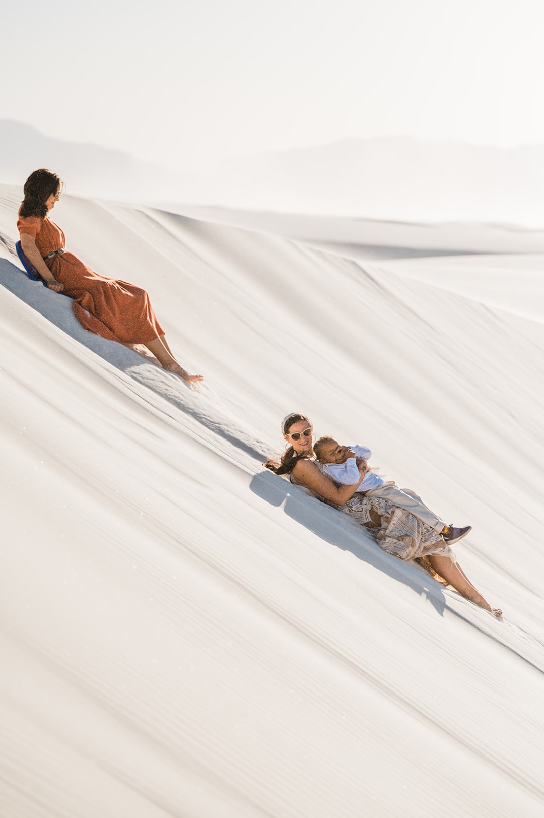 We love that the couple + guests sledded at this White Sands National Park elopement.