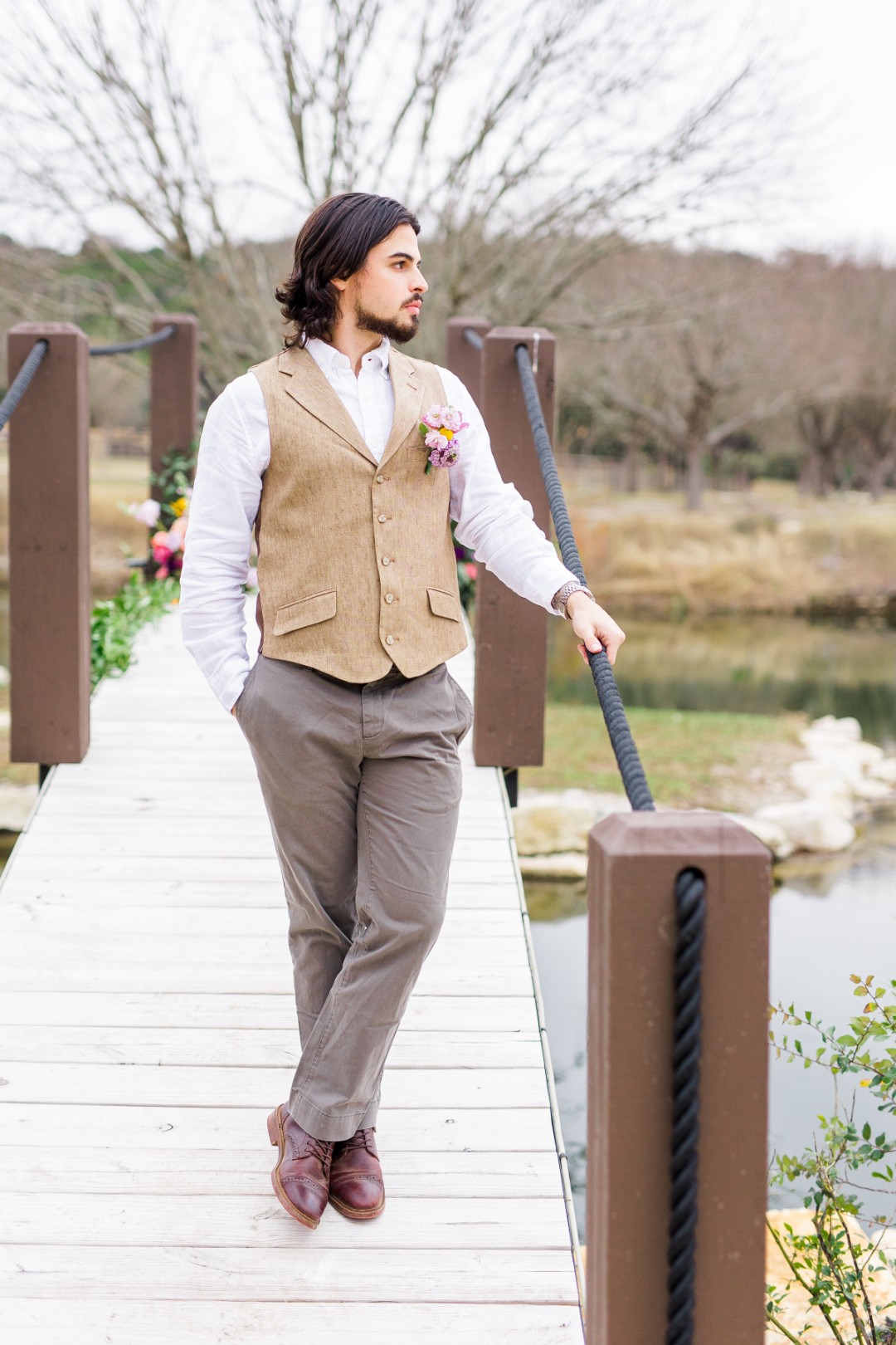 Flynn Rider is giving rugged chic vibes with this tan vest.