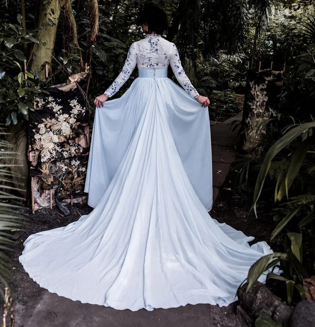 Longsleeved full back coverage light blue wedding dress