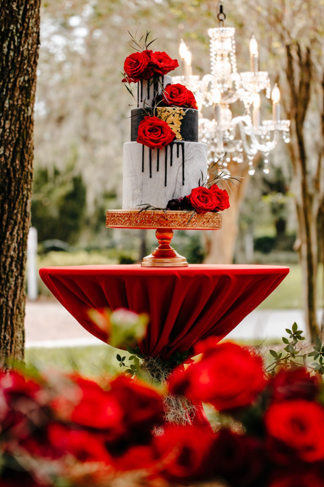 This black and white drip wedding cake is sexy vampire approved.