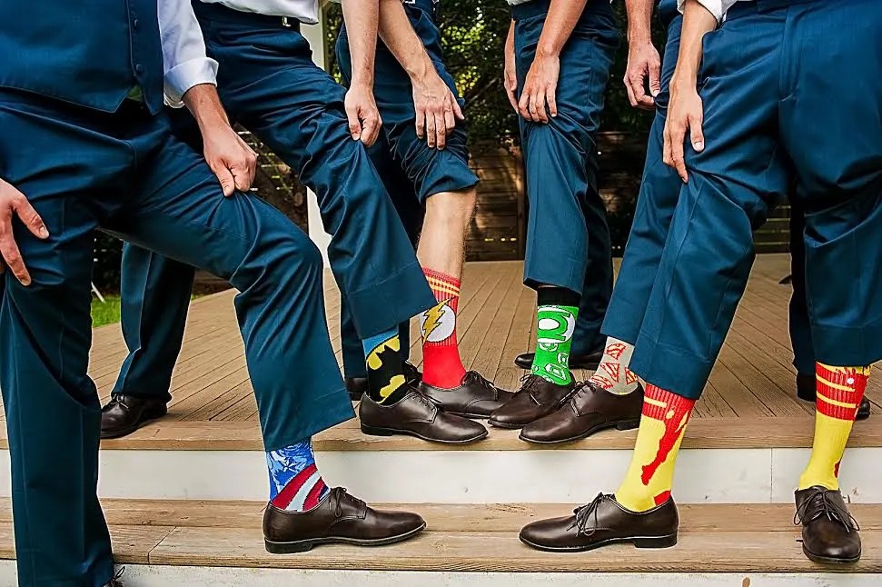 Get sneaky geeky with superhero socks for your wedding party