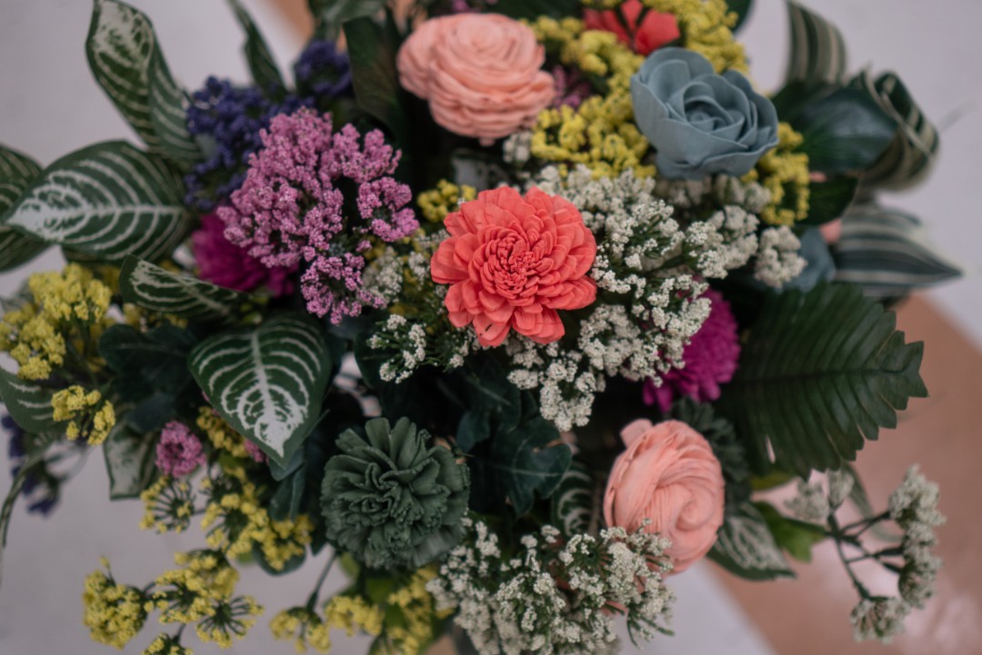 Their entire day was filled with bold, vivid colors from the bouquets and floral arrangements that Danya designed herself. Get a load of those colorful blooms!