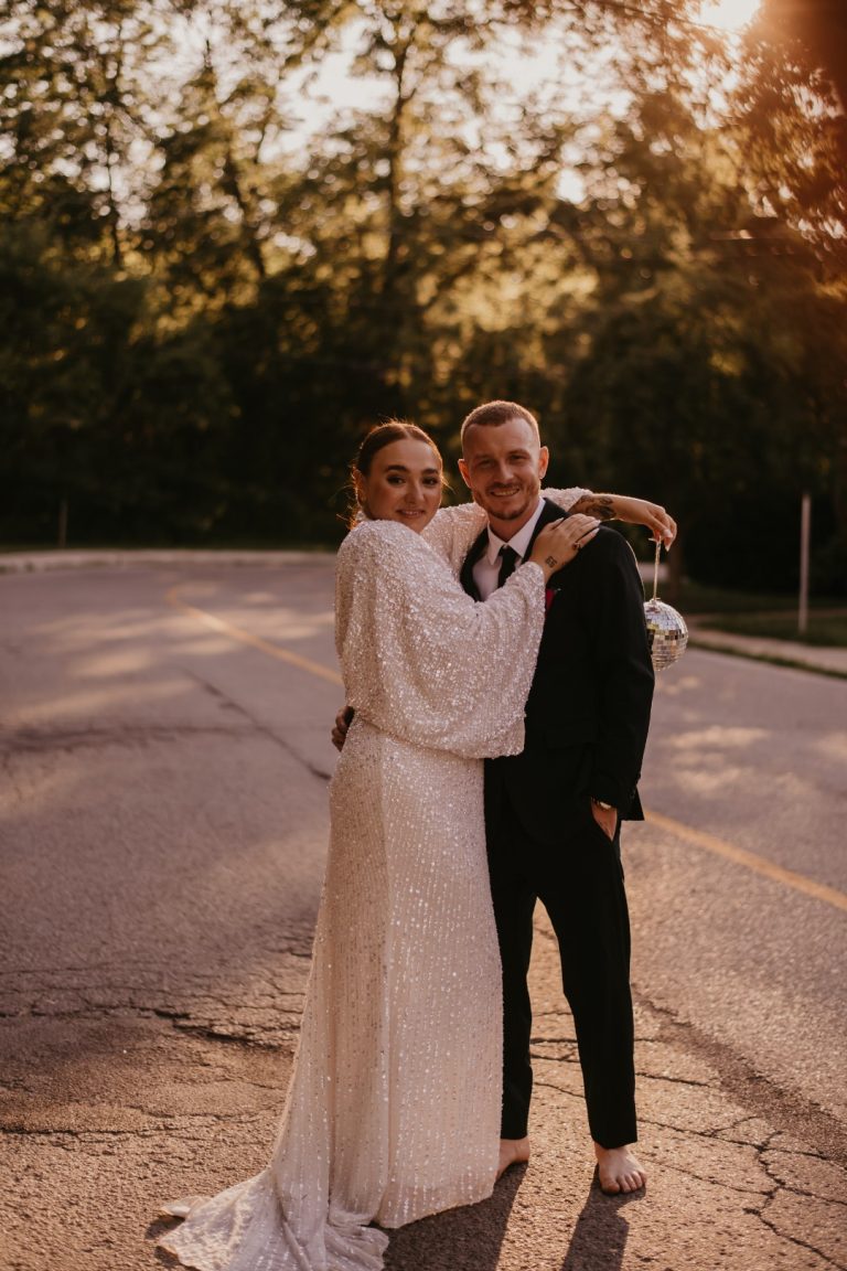 A Colorful Wedding With A Pink Pantsuit And A Disco Wedding Dress