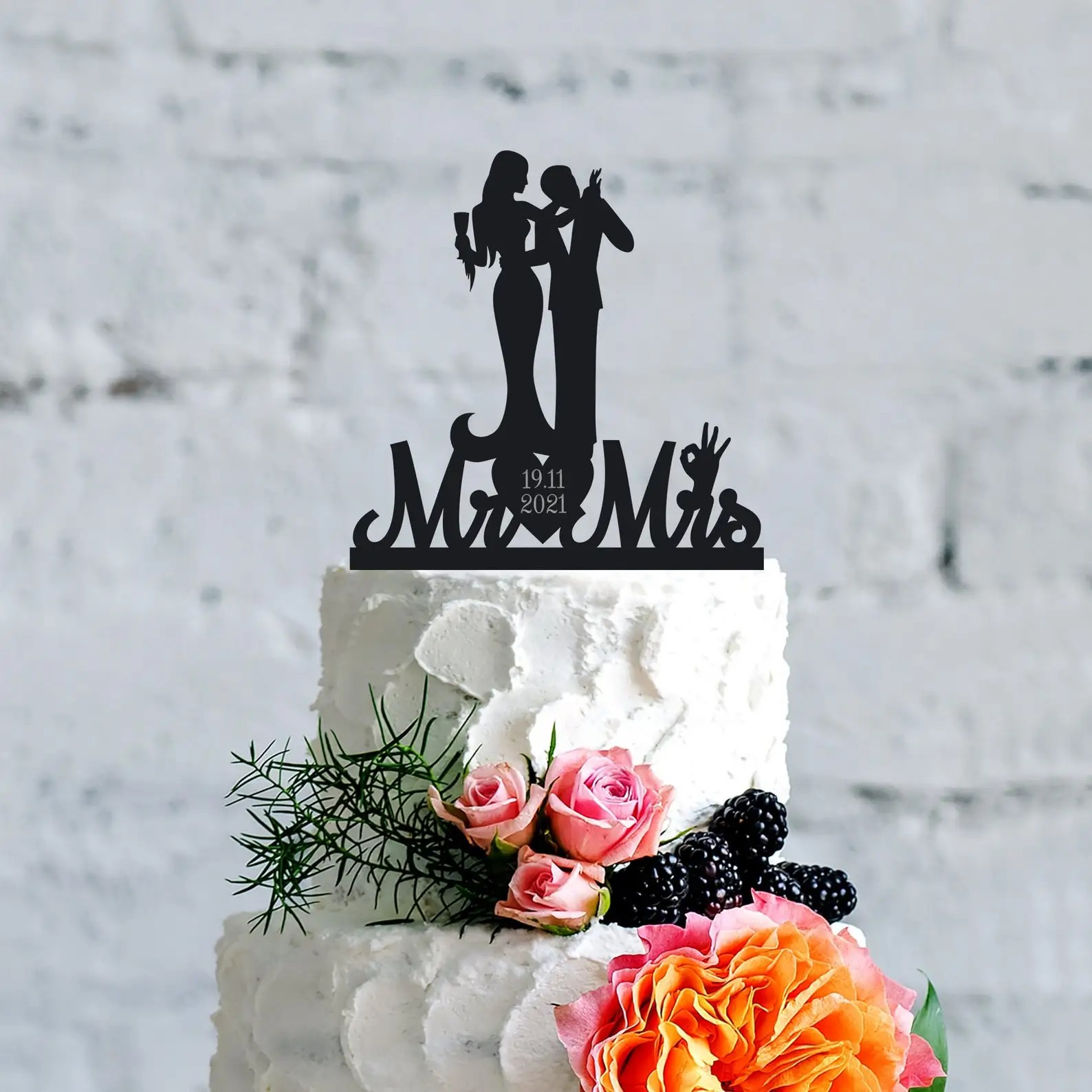 Pop culture goth cake toppers